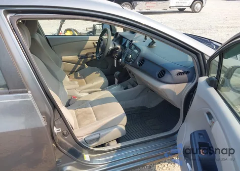 2010 Hond Insight z USA, uszkodzony, nr VIN JHMZE2H75AS027964